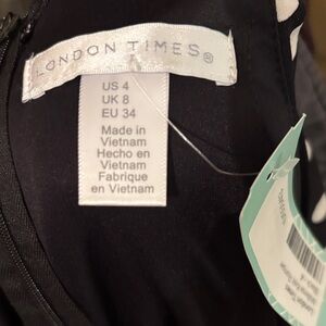 London Times Elegant Black and white romper